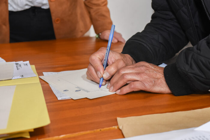 Familias linqueñas fueron parte de un nuevo acto de “toma de firmas” de escrituras 2 Acto de toma de firmas 3 scaled